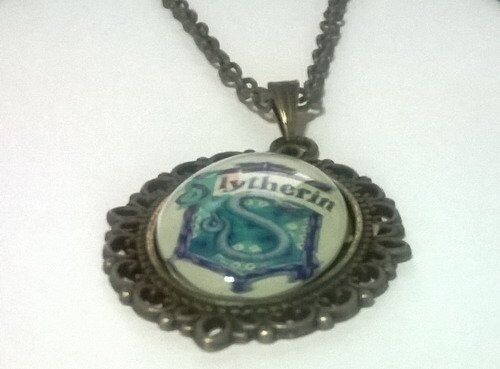 Медальон Harry Potter Slytherin 4х3 см.